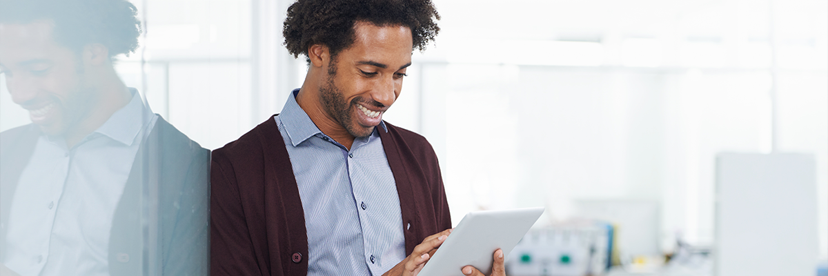 Employee using a tablet to access Xerox ConnectKey Apps